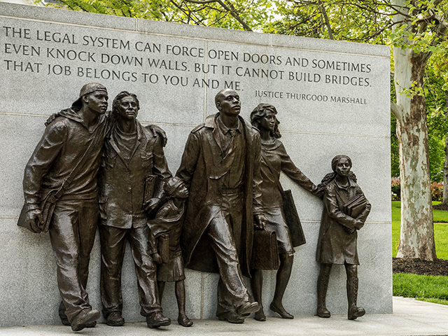 Historic Capitol Square Richmond Virginia Civil Rights Monument with quote from Thurgood Marshall (first African American U.S. Supreme Court justice). It reads: "The legal system can force open doors, and sometimes-even knock down walls, but it cannot build bridges. That job belongs to you and me."