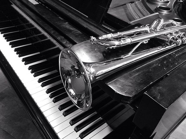 piano and trumpet closeup black and white